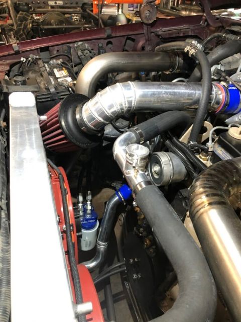 1996 Ford Bronco - 20200529 - Intake is additionally mounted to the AC bracket from DCS. The bracket was drilled and tapped and the intake bolted to it. Alumi…