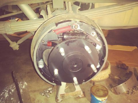 1996 Ford Bronco - The photo shows a close-up of a vehicle's rear drum brake assembly, likely during a repair or maintenance.