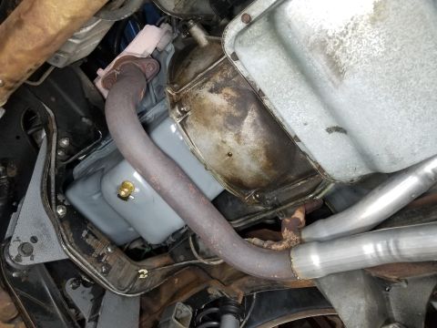 1989 Ford Bronco - There's a slow engine oil leak causing that drip in the middle of the bellhousing. IF THE IMAGE IS TOO SMALL, click it.
