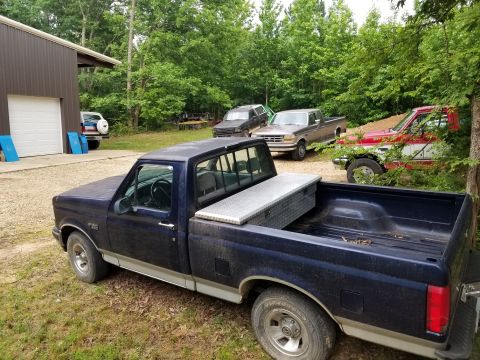 1983 Ford Bronco - The blue & white Bronco isn't mine. My 5th truck is the '93 EB Bronco that's in pieces around back & inside.