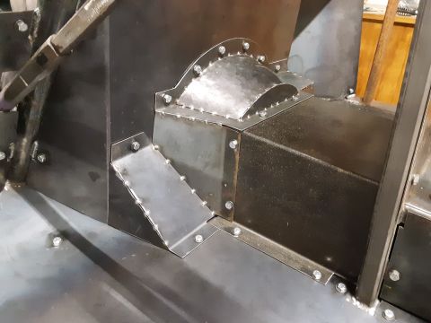 1985 Toyota Hilux - Custom metal fabrication is visible inside this vehicle, a bolted duct and box structure.