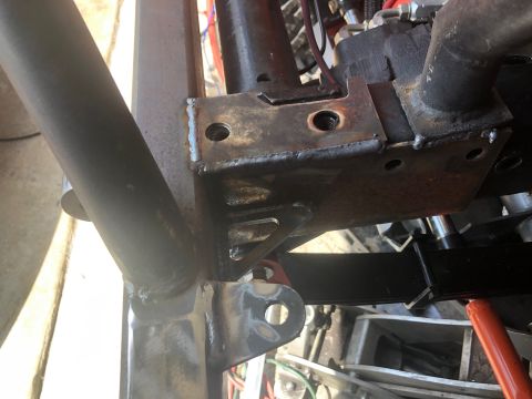 1992 Jeep Wrangler - This image shows a section of a vehicle's frame with newly welded brackets and structural tubing.