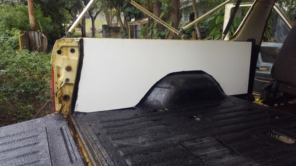 took out the old plastic factory panels that were flopping around. made some out of PVC board.