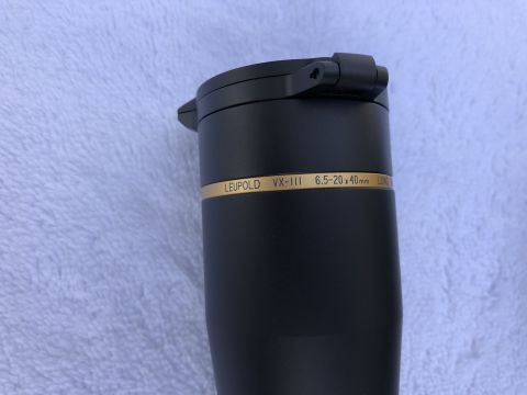1995 Mercury Grand Marquis - Close-up of a Leupold VX-III 6.5-20x40mm scope, showing the magnification and objective lens diameter.