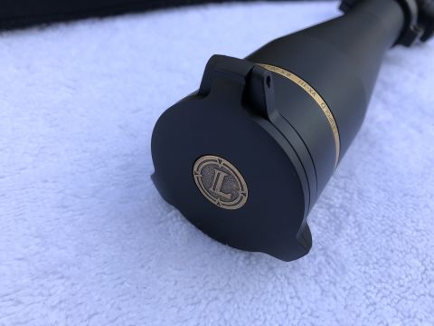 1995 Mercury Grand Marquis - A close-up view of a Leupold rifle scope, showing its branding and model information.