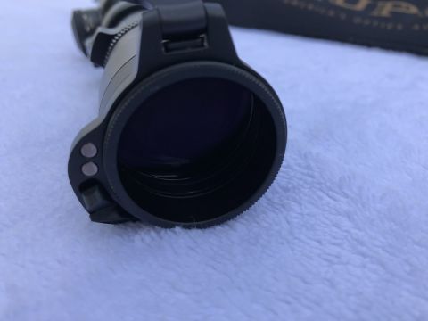 1995 Mercury Grand Marquis - This is a close-up view of the objective lens housing of an optical scope.