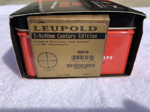 1995 Mercury Grand Marquis - A Leupold scope box is shown, with text detailing its specifications and a barcode.
