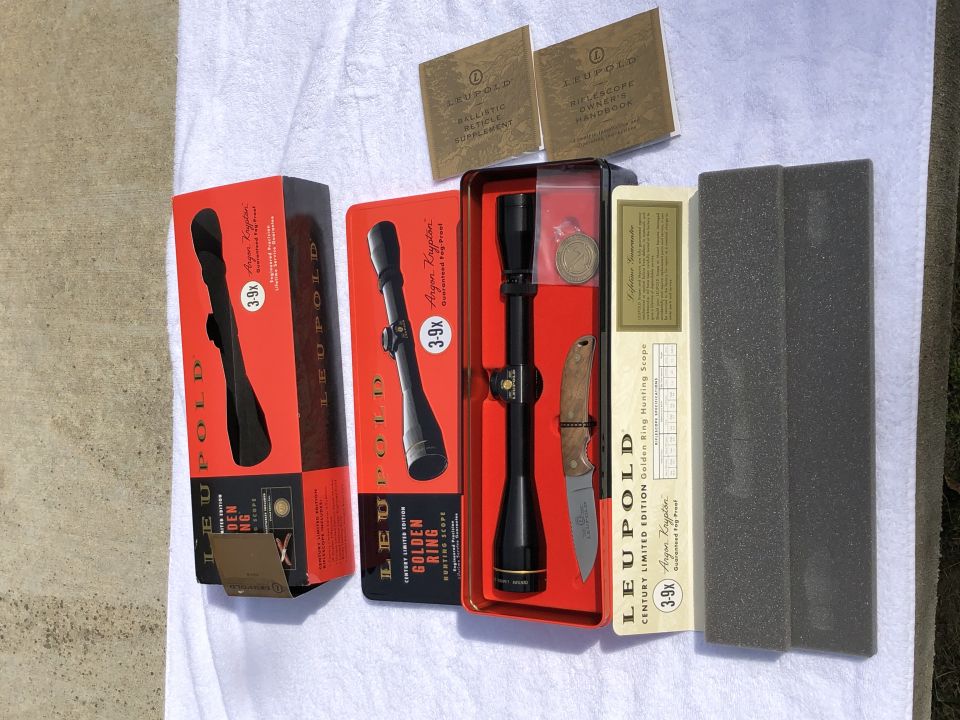 Leupold rifle scopes and accessories including a knife and manuals
