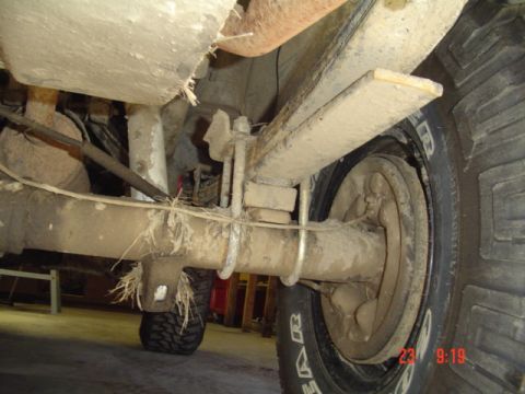 1989 Ford Bronco - Close-up of the rear axle and leaf spring suspension on a 1989 Ford Bronco.