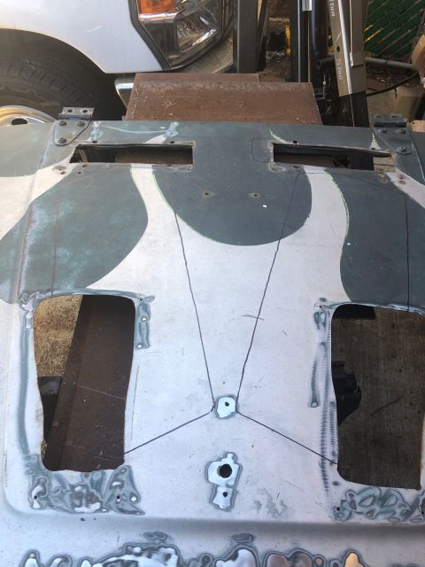 1992 Jeep Wrangler - This is a close-up of a modified Jeep hood, showing cutouts and repair work.