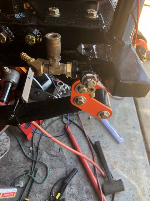 1992 Jeep Wrangler - Close-up of an automotive part with visible wiring and hardware, suggesting a repair or modification.