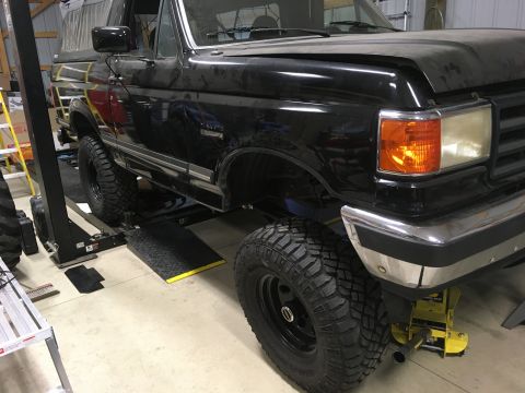 1987 Ford Bronco - Gotta take all the weight off the front to adjust the King coil overs ride height.