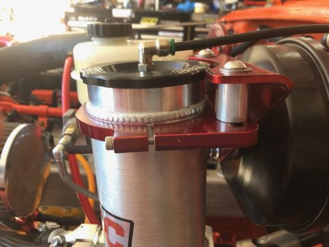 1992 Jeep Wrangler - Custom engine bay part with visible branding and plumbing.