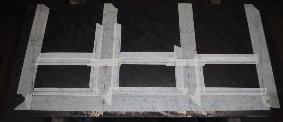 Winch plate layout on 9/32" steel plate.  As you can see, I tweaked the plan a few times while sketching it out.
