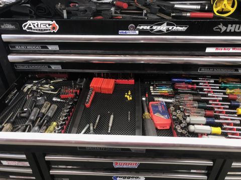 1992 Jeep Wrangler - A close-up view of an open toolbox drawer filled with various screwdrivers and hex wrenches.