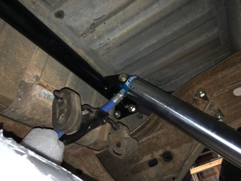 1987 Ford Bronco - Had to remove the heat shield over the muffler to mount the upper shock bar.