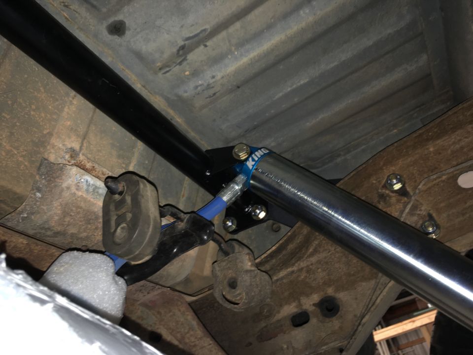 Had to remove the heat shield over the muffler to mount the upper shock bar.