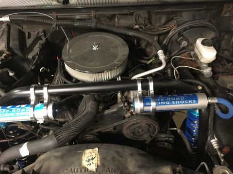 1987 Ford Bronco - Final mounting of the front shock reservoirs.