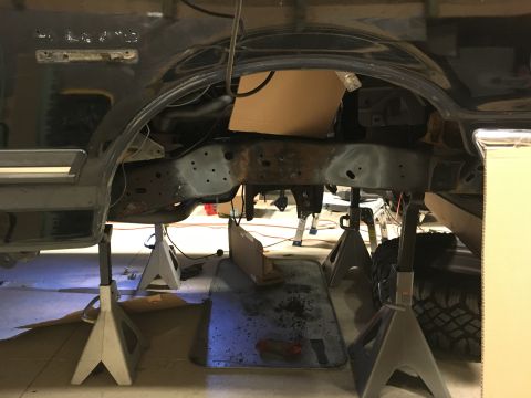 1987 Ford Bronco - Ripped out all stock front suspension and prepped for welding front shock hoop.