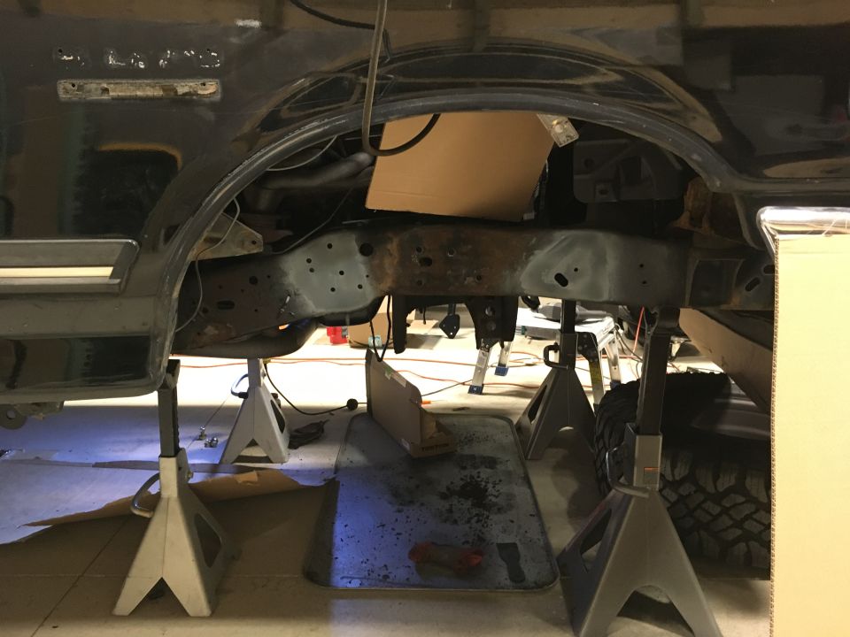 Ripped out all stock front suspension and prepped for welding front shock hoop.