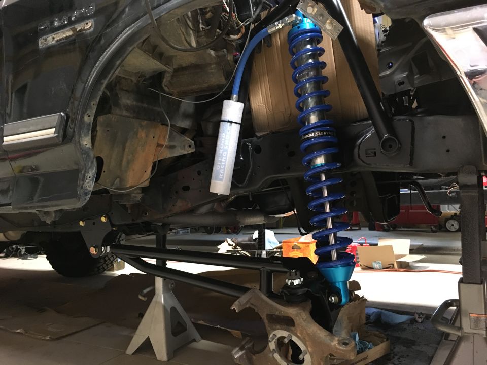 Radius arm, traction beam and knuckle mocked up.  Ended up pointing the reservoirs towards the front of the truck.