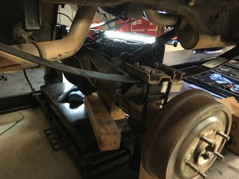 1987 Ford Bronco - Disassembled the rear leafs. Used steel tubing to take up the space of the lower 9 leafs to measure full compression needed to weld in lowe…