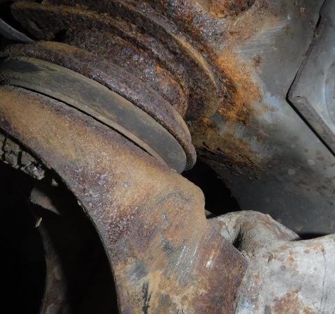 1992 Ford Bronco - Cleaned up around the front right body mount for rust treatment; the damage is worse than originally thought.