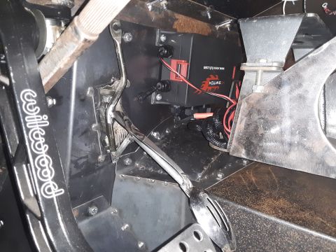 1985 Toyota Hilux - Custom interior wiring and pedals are visible in this close-up shot.