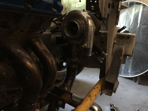 1993 Mercury Tracer - Close-up of a turbocharger and exhaust manifold assembly, likely for an engine modification.