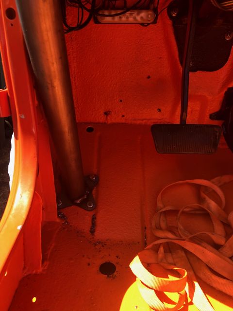 1992 Jeep Wrangler - Interior view of a vehicle's floor pan with a roll cage and pedals visible.