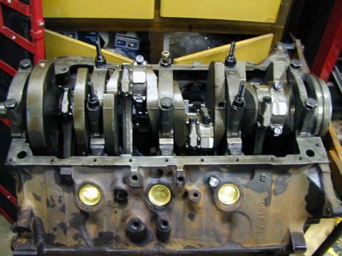1979 Ford Bronco - Engine block with crankshaft and connecting rods exposed, showing internal components.