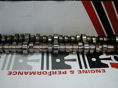 1979 Ford Bronco - Camshafts are shown on a box that reads 'ENGINE & PERFORMANCE' and 'SUPERMOTORS.NET'.