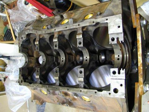 1979 Ford Bronco - Engine block with crankshaft bearings visible. Supermotors.net logo in lower right.