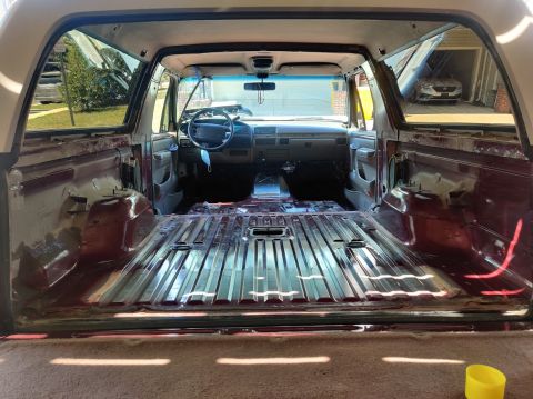 1996 Ford Bronco - 20200718 - Progression of cleaning, laying out the first stage of sound deadening (CLD tiles), and applying them to the floor.