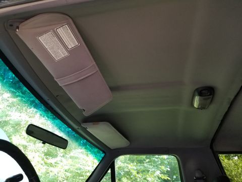 1996 Ford Bronco - The dome lamp doesn't work because it's installed backward. A visor hook was also missing. $0 DONE