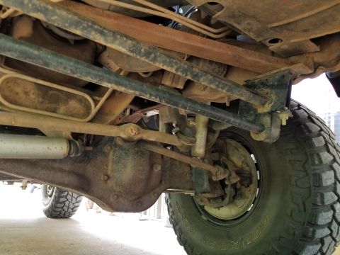 1996 Ford Bronco - The drop pitman arm, shocks, & steering damper are from Rough Country. There's a bunch of steel booger-welded on for the steering & suspens…