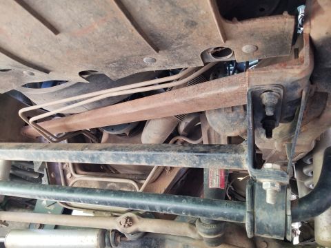 1996 Ford Bronco - The drop pitman arm, shocks, & steering damper are from Rough Country. There's a bunch of steel booger-welded on for the steering & suspens…