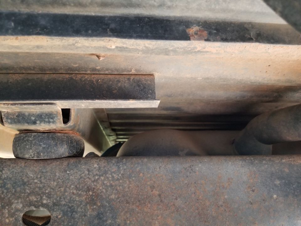 Left 4th body mount upper shell is also severely rusted.