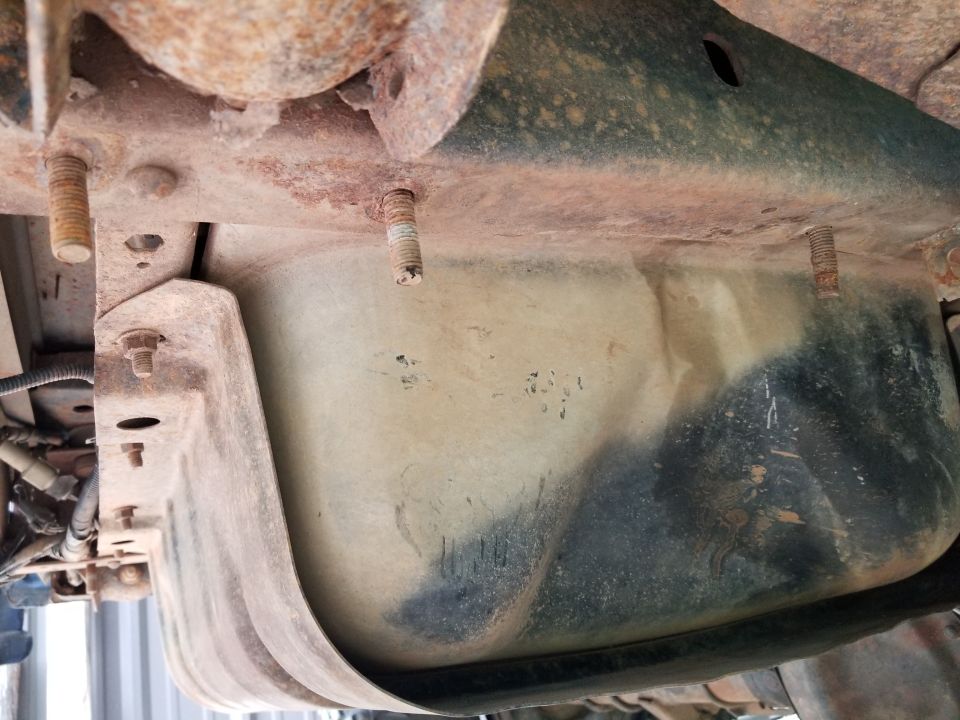 The frame is slightly bent where the receiver used to be bolted beside the gas tank.