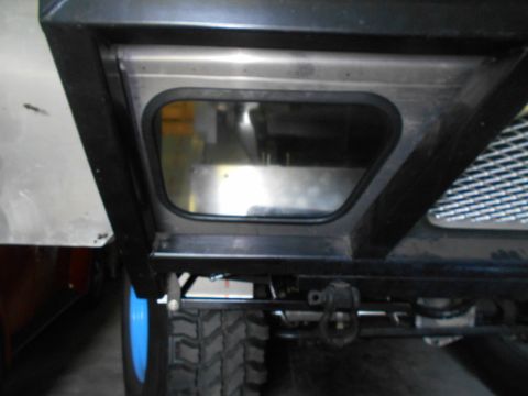 1992 Ford Bronco - This image shows a portion of a vehicle's undercarriage, including a tire and frame details.