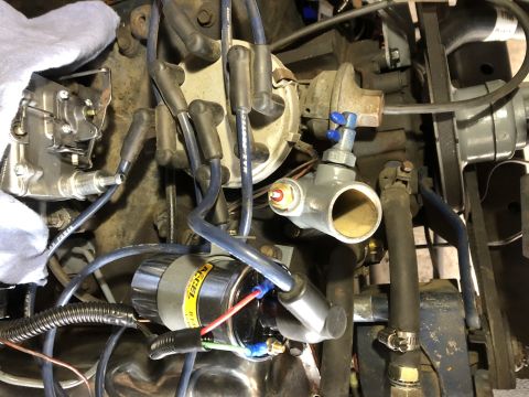 1978 Ford Bronco - Engine components visible in the photo include a carburetor, distributor, and ignition coil.