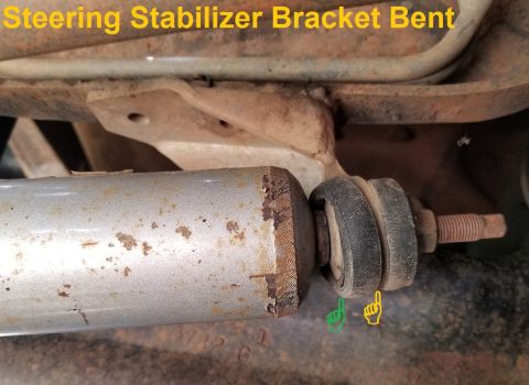 1996 Ford Bronco - The steering stabilizer bracket is welded instead of bolted to the frame, and appears bent. But it's probably OK like that.