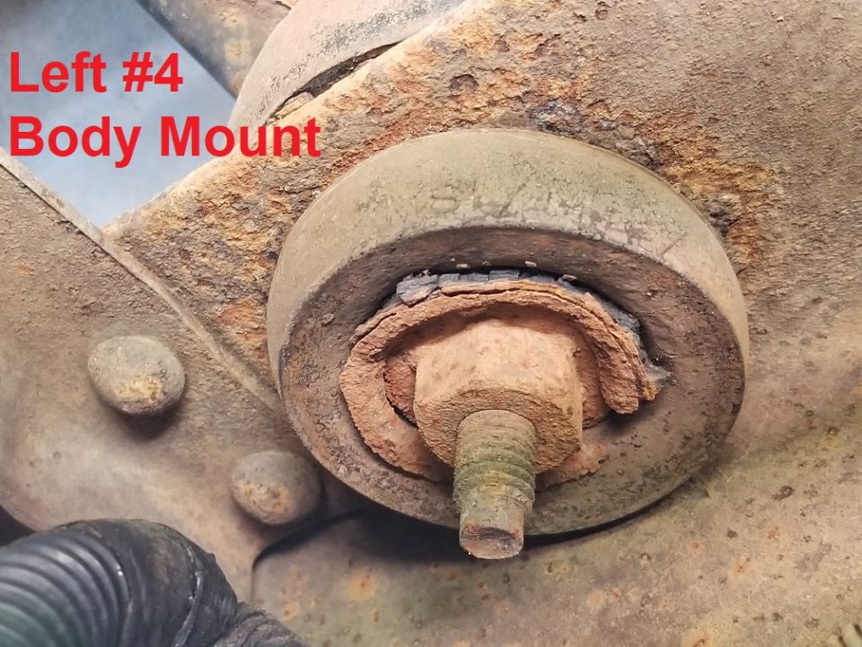 rusted body mount bolt with visible text 'Left #4 Body Mount'