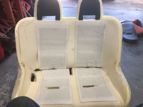 1992 Jeep Wrangler - Uncovered car seat foam shows the heating elements before upholstery is applied.