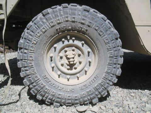 1981 Ford Bronco - Close-up of a heavy-duty tire and wheel assembly on a vehicle.