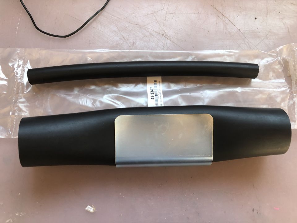 two black rubber hoses, one with a metal clamp, and a label with 43-3347 on it