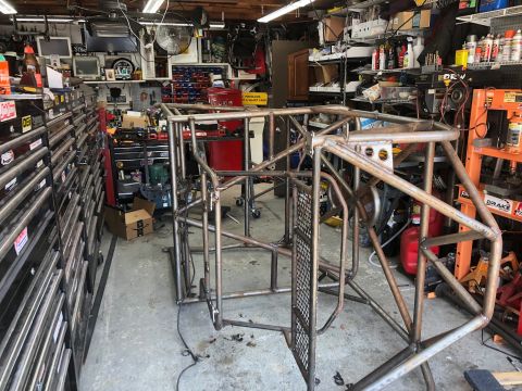1992 Jeep Wrangler - Custom roll cage frame under construction in a workshop environment.