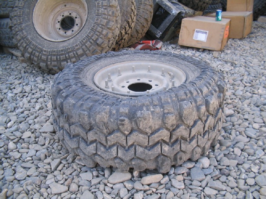 Off-road tire and wheel on gravel