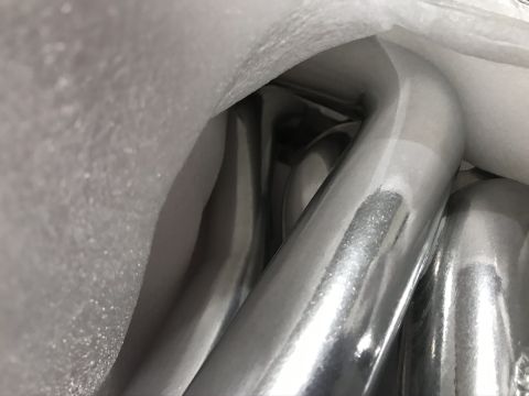 2004 Ford Crown Victoria - Chrome exhaust headers are shown packed in white foam material.
