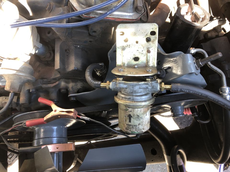 Needed to pump out all the bad fuel before I tried to start it up. Battery charger and an electric pump work better than dropping the tank.